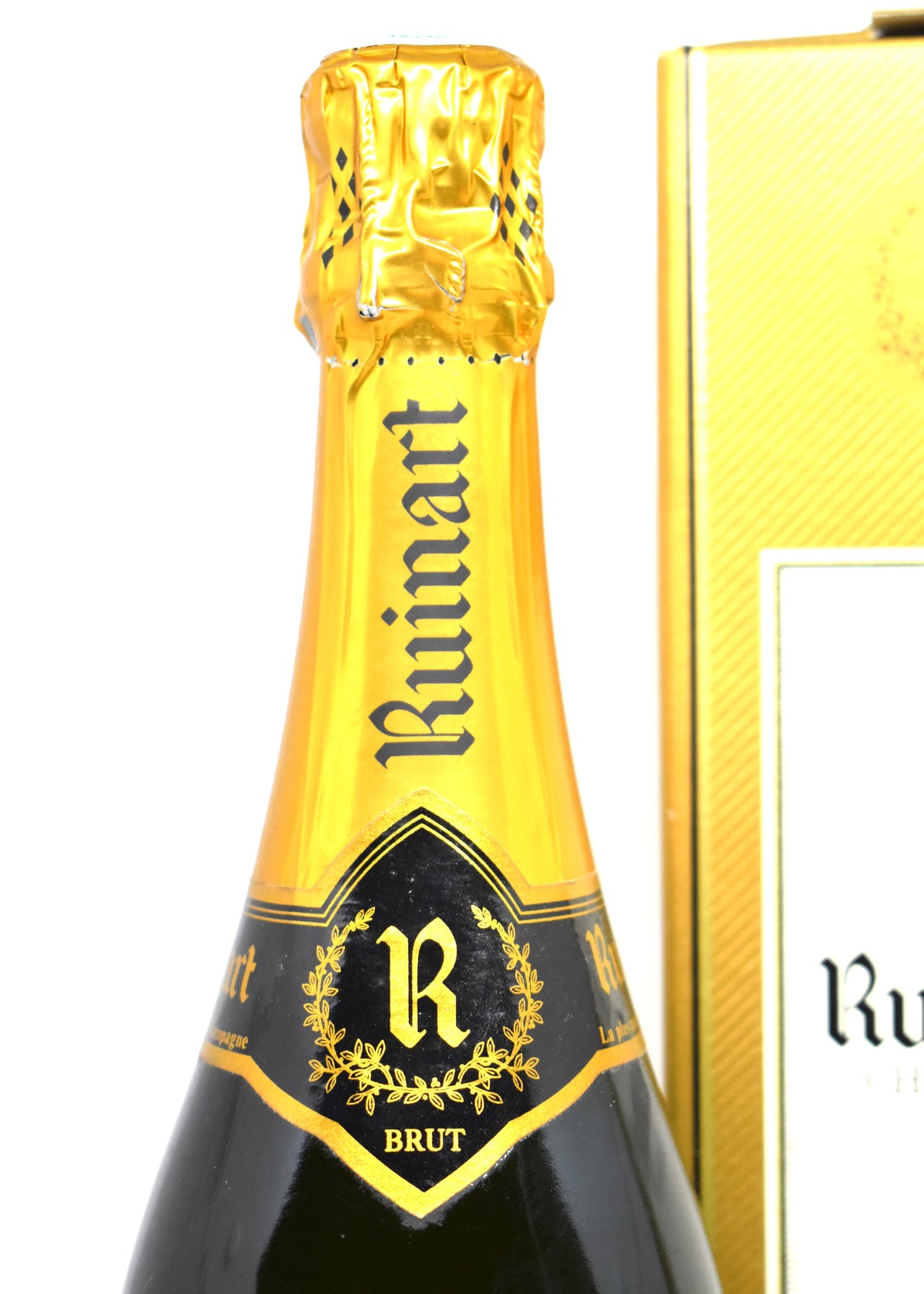 Ruinart old bottle gold and white ?